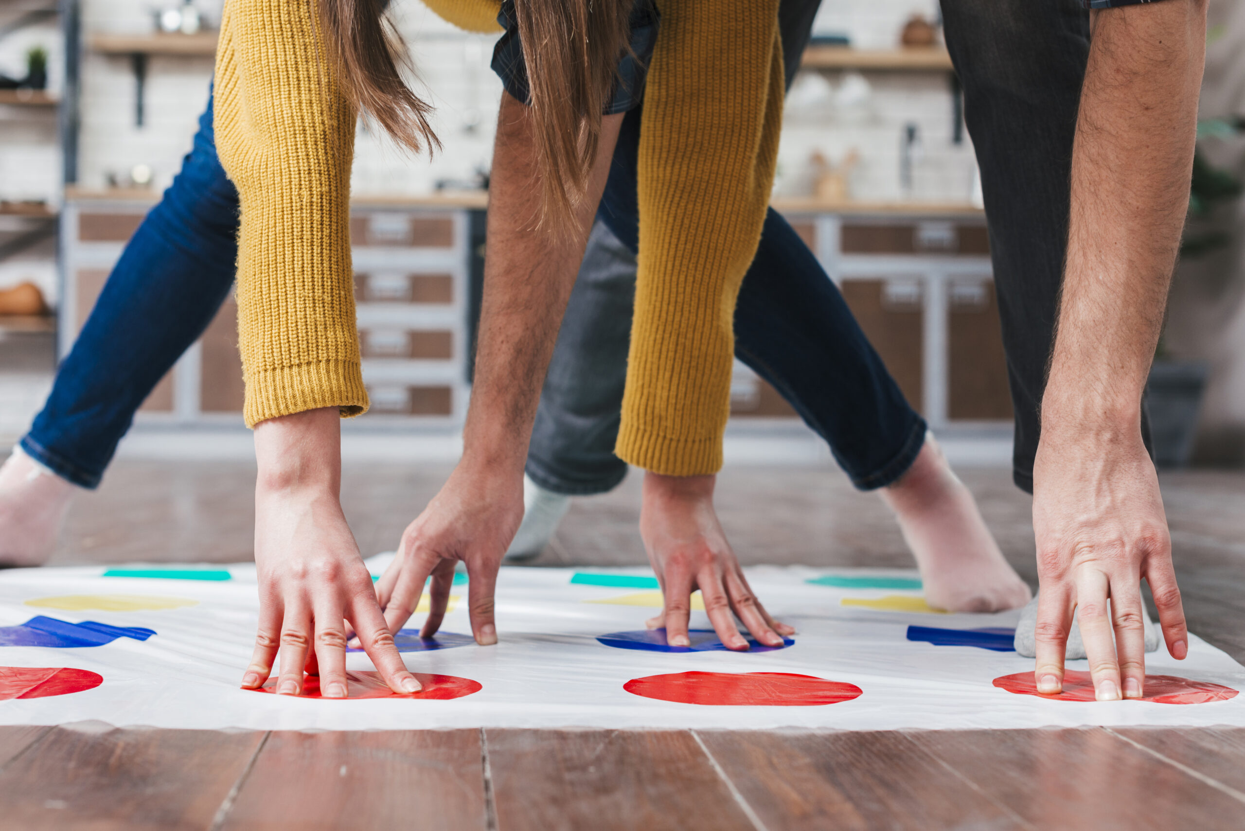 close-up-couple-playing-twister-house